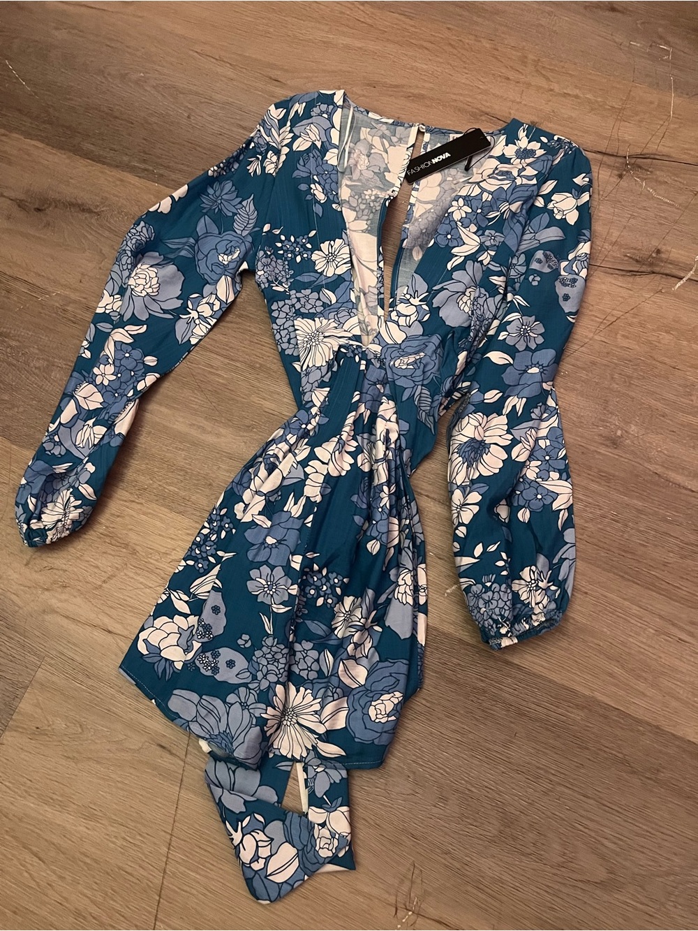 Fashion Nova Blue & White Floral Wrap romper